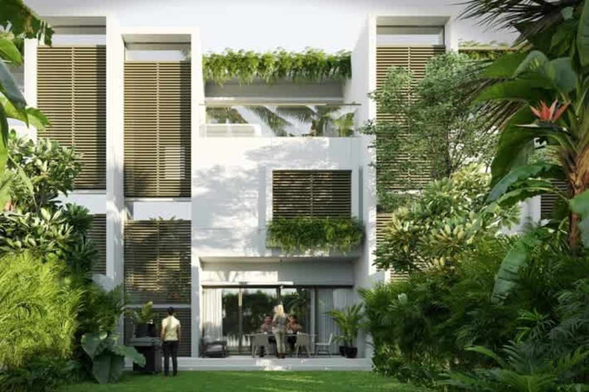 Modern apartment facades with balconies greenery palm trees luxury marina Ocean Reef Panama