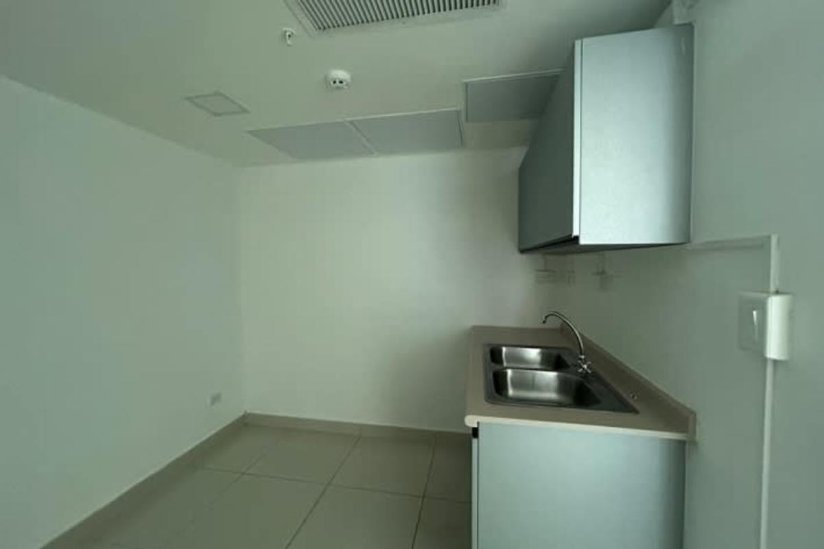 Modern office with floor-to-ceiling windows overlooking Pacific Ocean and skyline in Panama