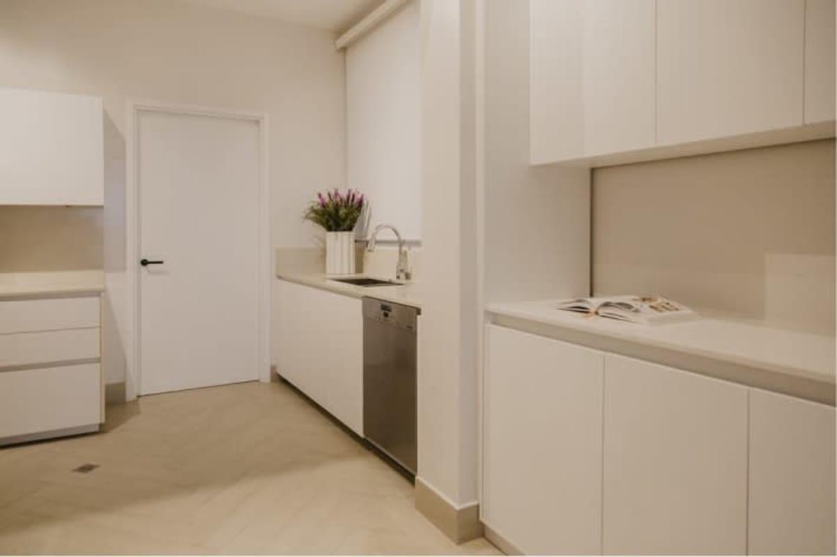 Modern Italian kitchen with quartz countertops and high-end appliances at Ocean Reef Island Panama