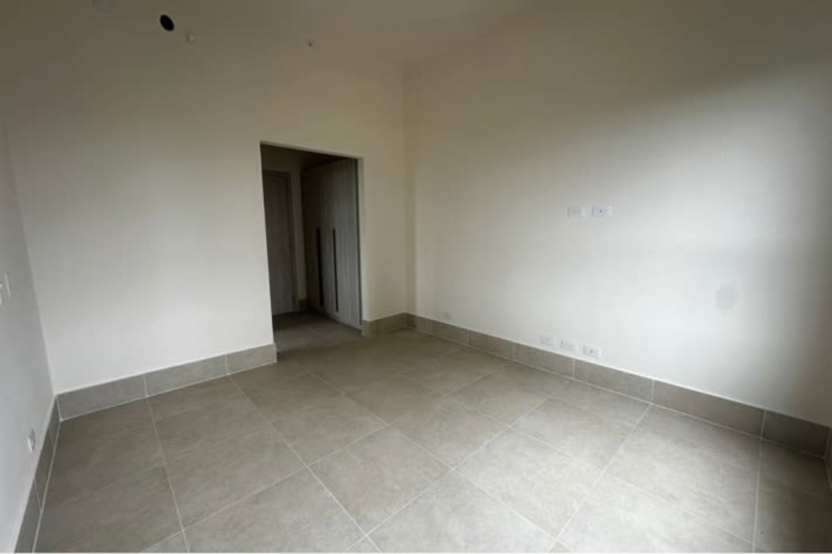 Built-in wardrobe and doorway in modern apartment at PH Ocean House Santa Maria Panama