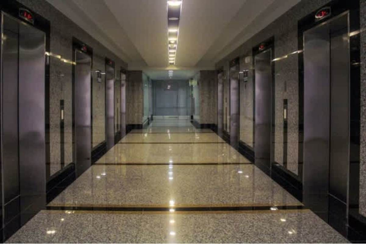 Modern glass-partitioned office interior with lighting BICSA Tower Panama