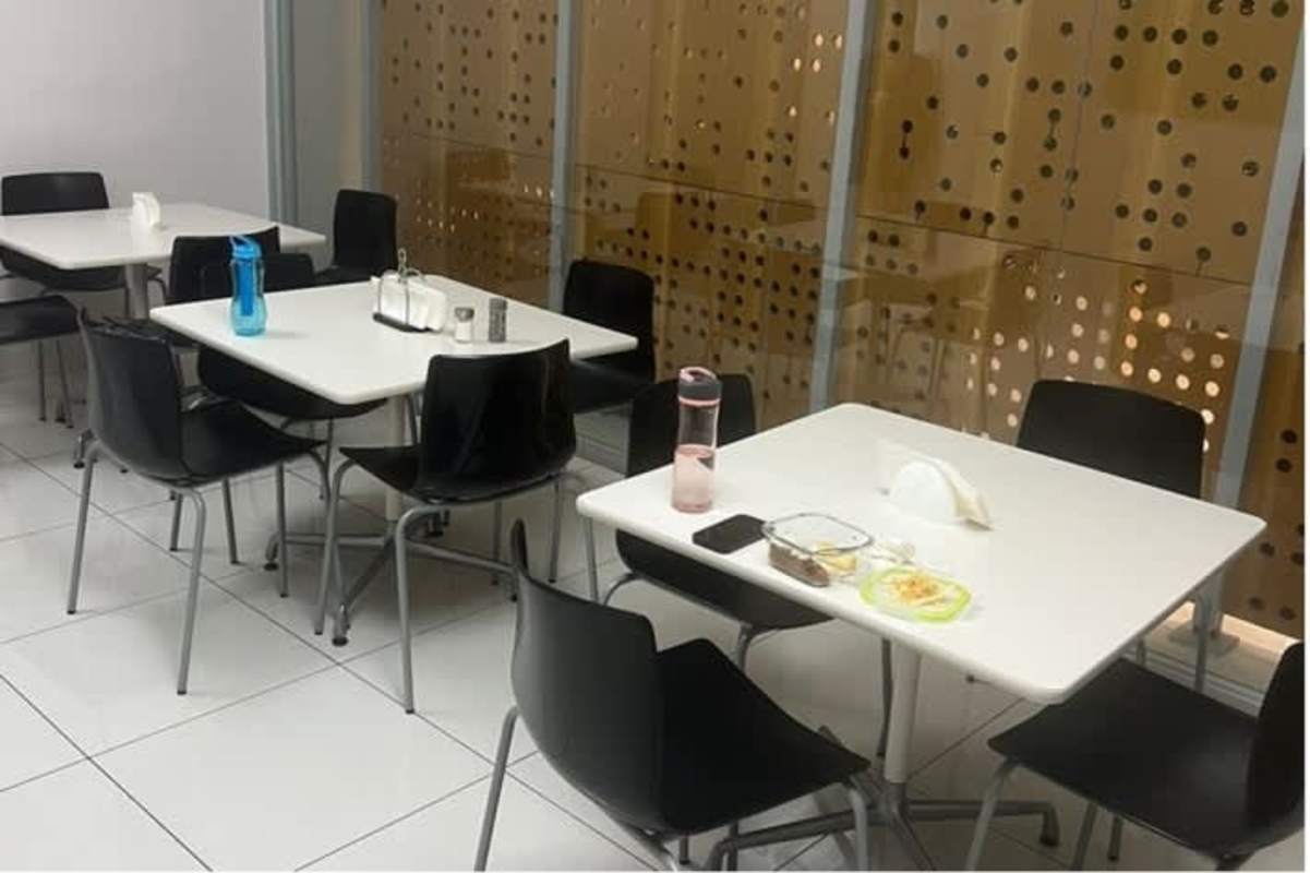 Shared pantry kitchen with appliances, white furniture, gray cabinets in Commercial Plaza Obarrio