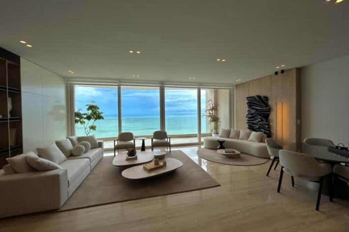 Light-filled living room with floor-to-ceiling windows and ocean views in The Towers Panama