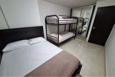 Bedroom with queen and bunkbed mirror closets beach condo PH Playa Corona Panama