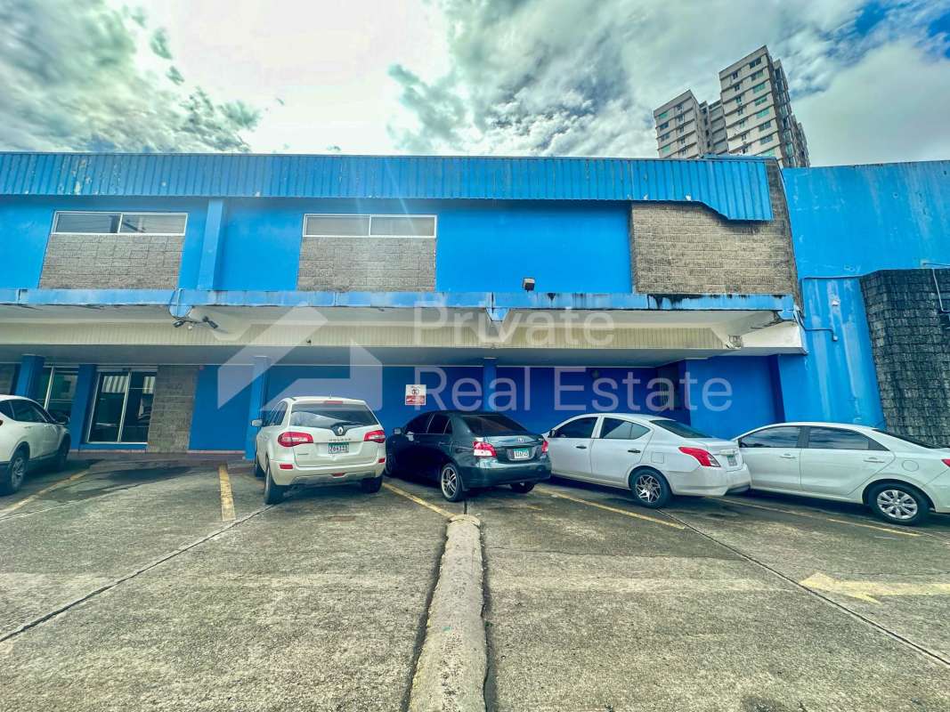Parking lot with commercial complex main entrances adjacent to Via España Panama City
