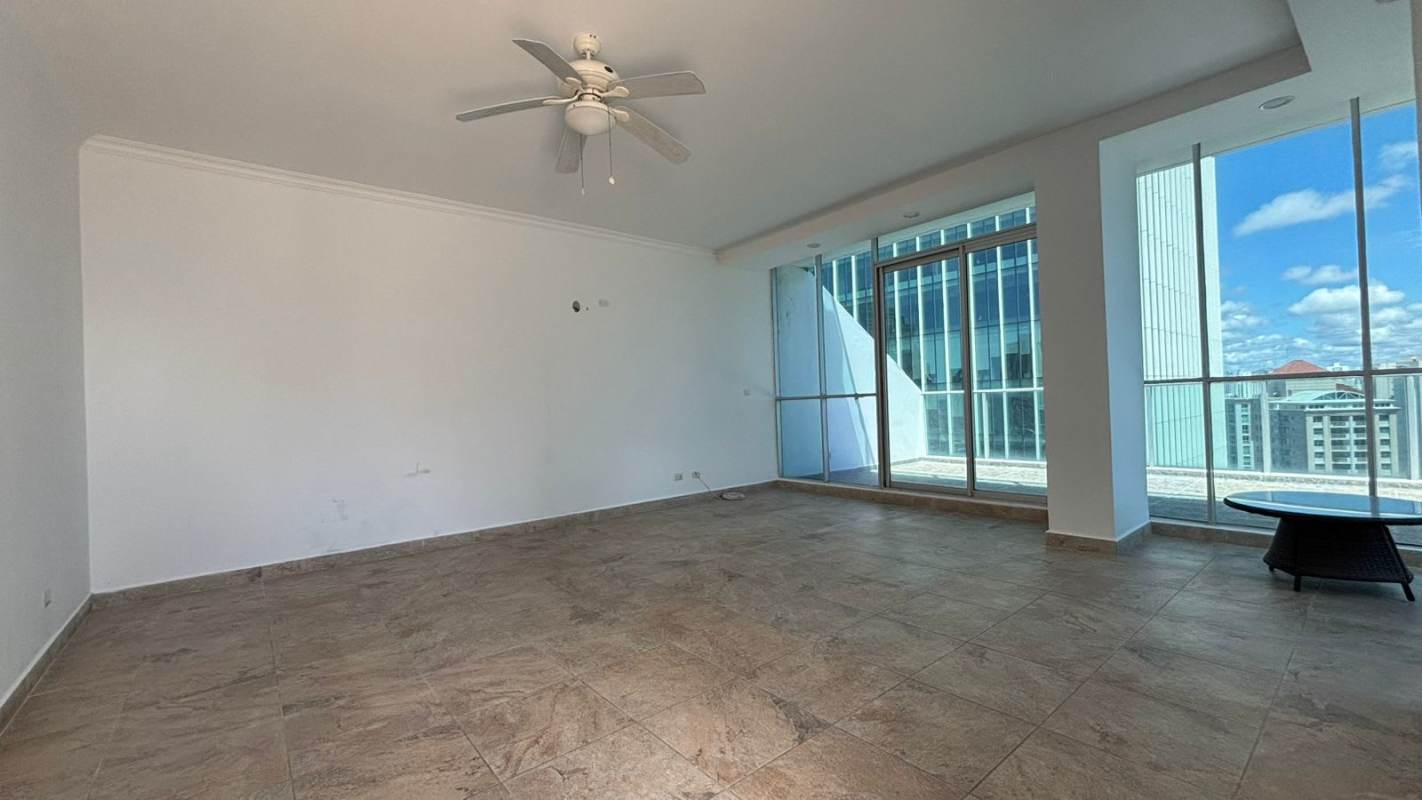 Living room with floor-to-ceiling windows city ocean views Punta Pacifica