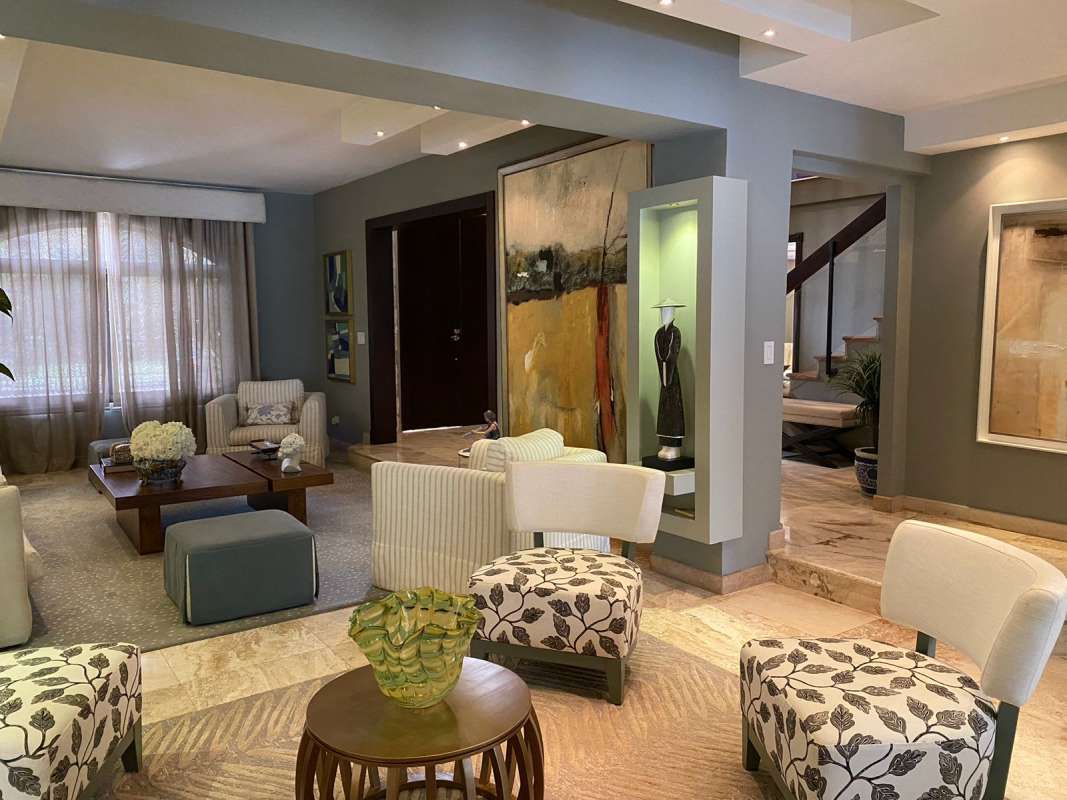 Beautiful private swimming pool and jacuzzi in lush backyard of estate home in Costa del Este Panama