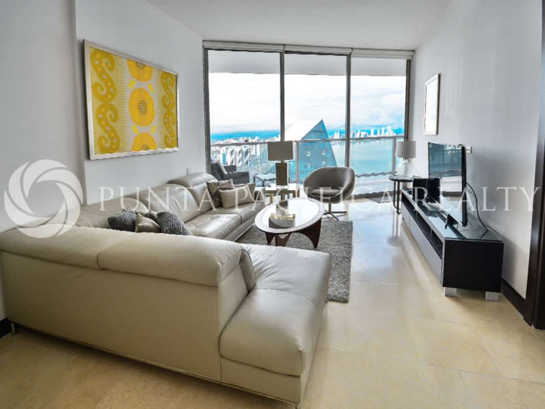 Spacious living room with floor-to-ceiling windows and ocean view in JW Marriott Ocean Club Panama
