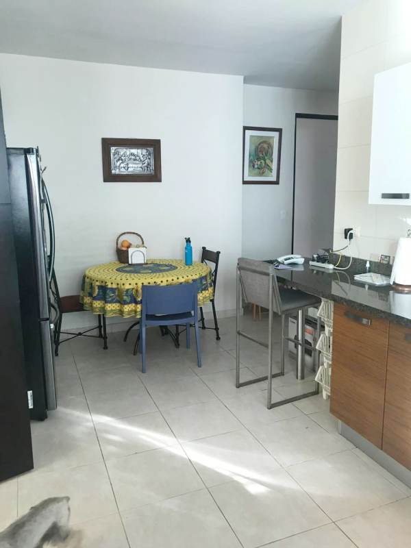 Bright living room with access to balcony in PH Alcalá Costa del Este Panama City