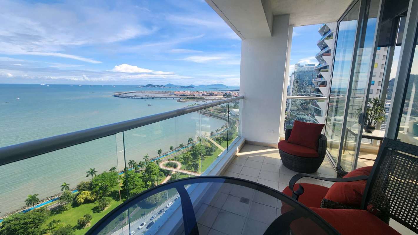 Marble-finished bathroom with glass shower and modern fixtures PH Rivage Tower Panama City