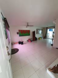 Living area with tile floors fan sliding doors Versalles Oeste Panama Oeste