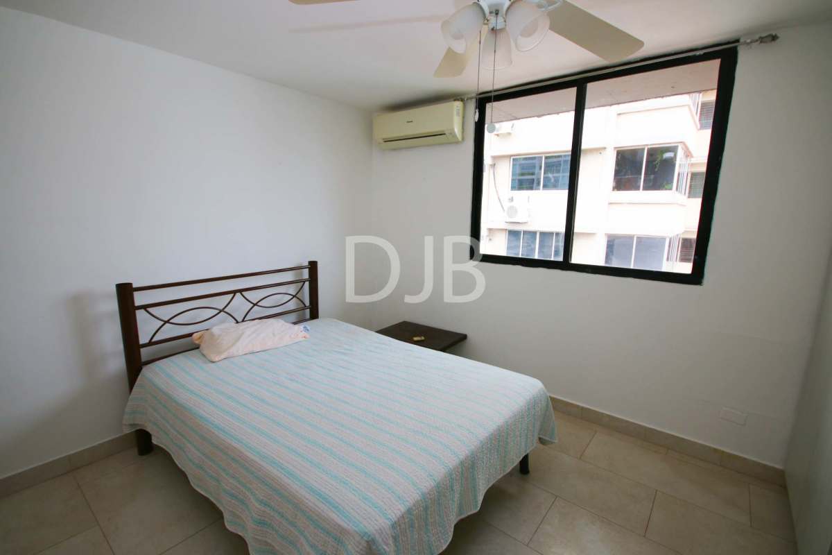 Second bedroom with window, AC, fan and closet PH San Francisco Panama