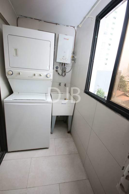 Laundry space with washer dryer combo, water heater and sink in PH San Francisco Panama