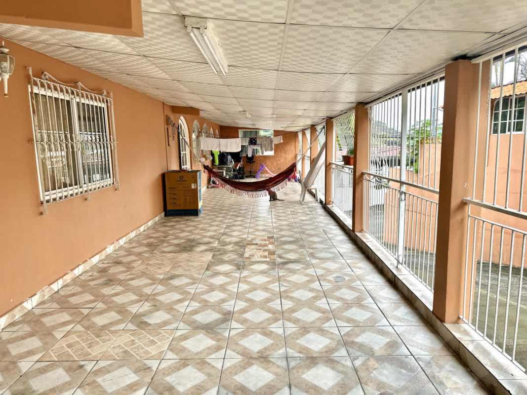 Covered terrace tiled floor hammock garden view Campo Verde Las Cumbres Panama
