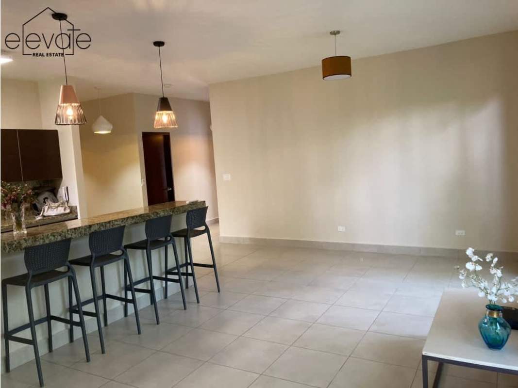 Bright second bedroom with built-in closet garden views Embassy Village Clayton condo