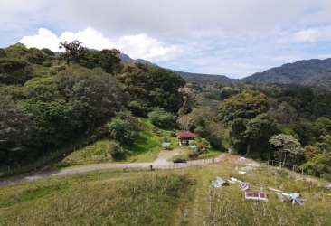 Off-grid house with solar panels in mountain landscape ideal for eco retreat Boquete Panama