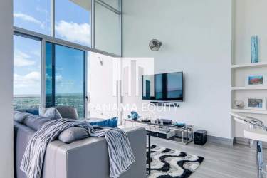 Spacious living room with floor-to-ceiling windows and Pacific Ocean view in Bahía Gorgona Penthouse