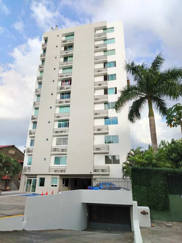 Living dining area opens to balcony with ceiling fan at PH Albrook Point, Clayton Panama City