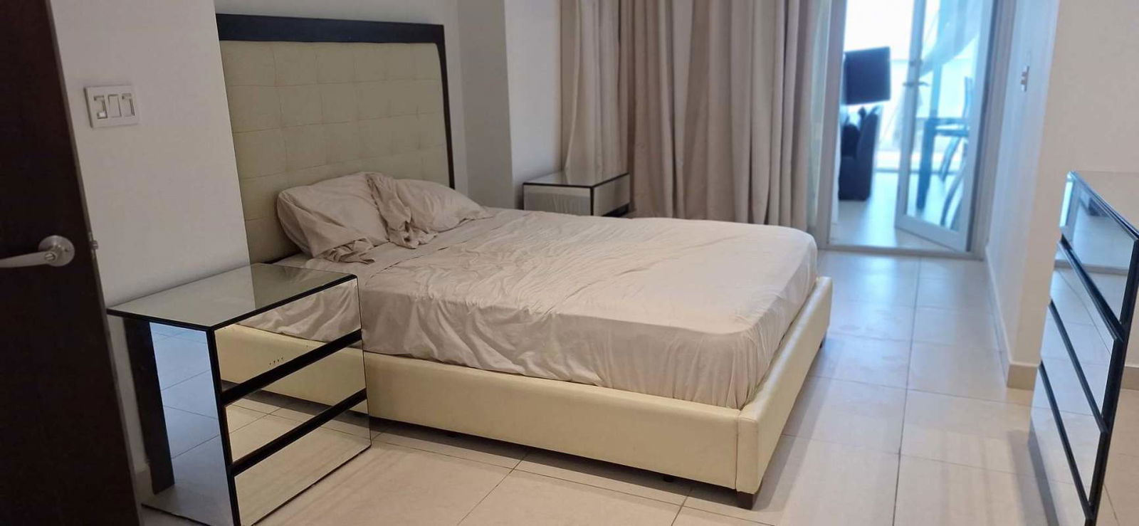 Bright living room floor-ceiling windows ocean view PH Rivage Panama