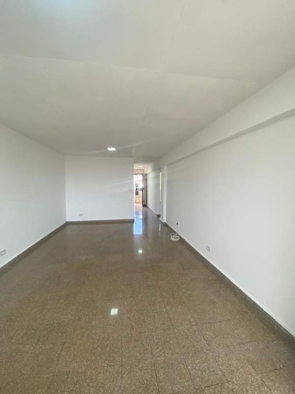 Modern mid-rise apartment with balconies and retail shops Edificio Dolores Panama