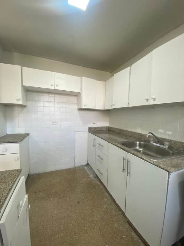 Traditional apartment kitchen granite counters double sink Panama City