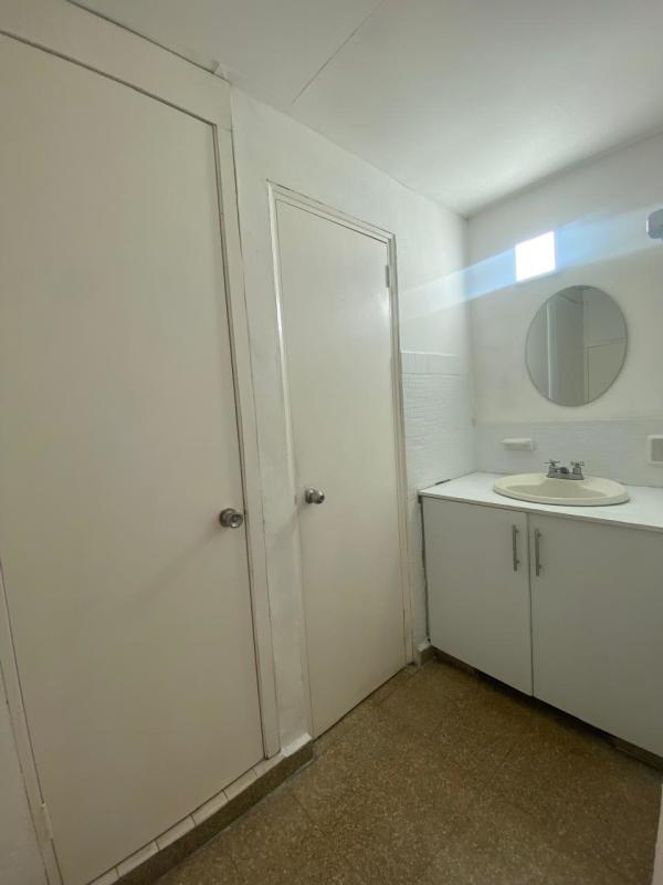 Bathroom vanity with mirror and natural light Edificio Dolores Parque Lefevre Panama