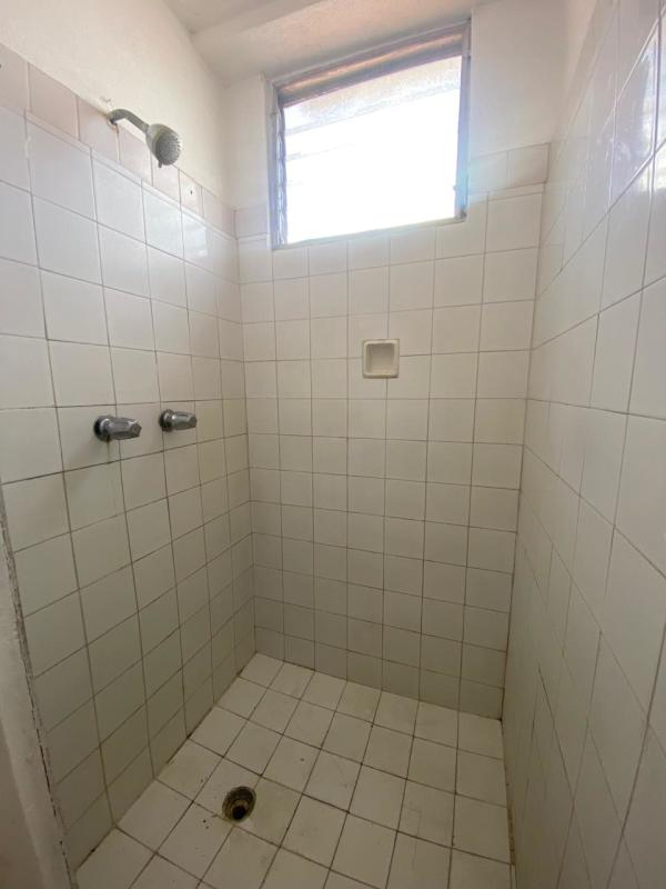 Simple tiled shower with window Edificio Dolores Panama City