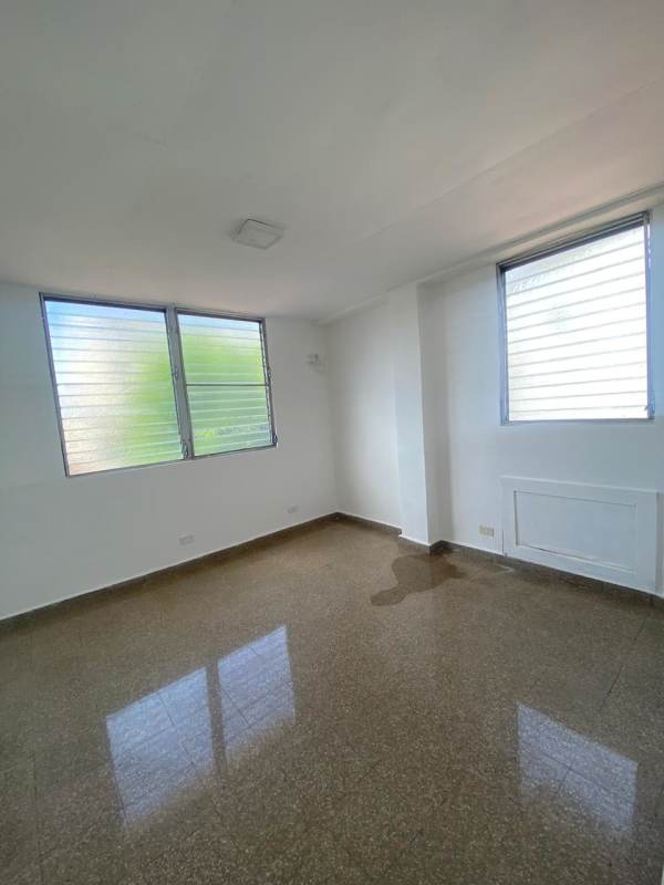 Bedroom with mirrored wardrobe, tiled floor, window Parque Lefevre Panama