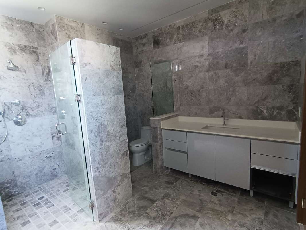 Spacious gourmet kitchen with marble floors, island counter, quartz finishes at PH Empire Residences Santa María