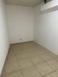 Unfurnished room with white walls and tile floor in office rental Panama