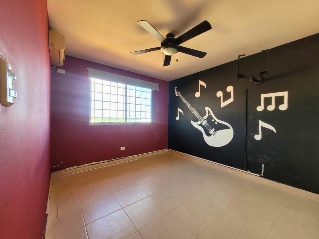 Bedroom or music room with guitar mural, AC, ceiling fan duplex Cerro Viento Panama
