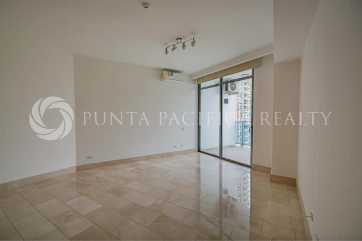 Spacious living area floor-to-ceiling windows panoramic view Grand Tower Panama