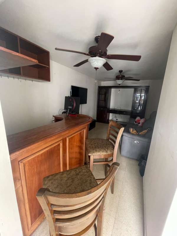 Spacious bedroom with large windows city skyline view in Punta Paitilla Panama