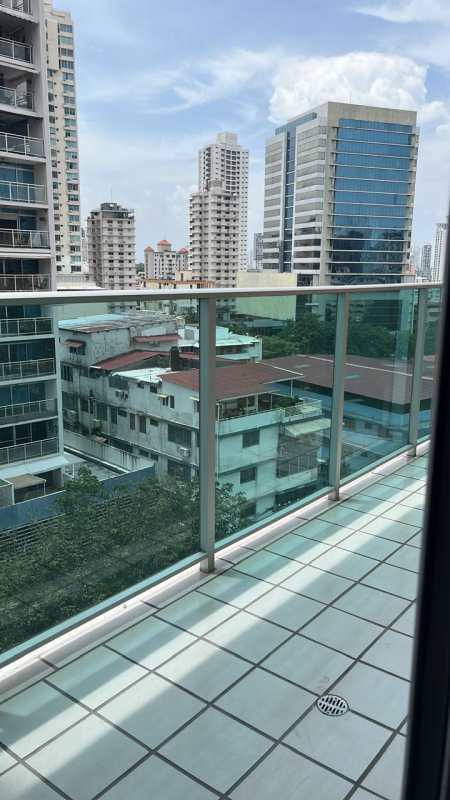 Large pool social area with palm trees at PH Trinity Tower El Carmen Panama