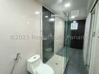 Bathroom with walk-in shower modern sink tile finishes Villa Montelimar Panama