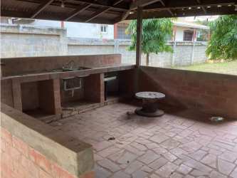 Rustic outdoor kitchen with brick counters and sink in Marejobo Chitré Panama