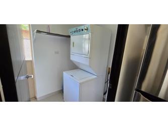 Contemporary bathroom with walk-in shower vanity and neutral tiles rental Woodlands