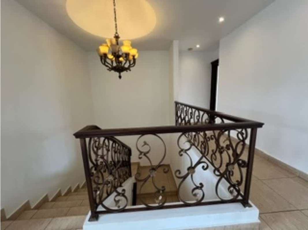 Traditional bright living room with tray ceiling, chandelier, large windows PH Costa Dorada Santa Maria Panama