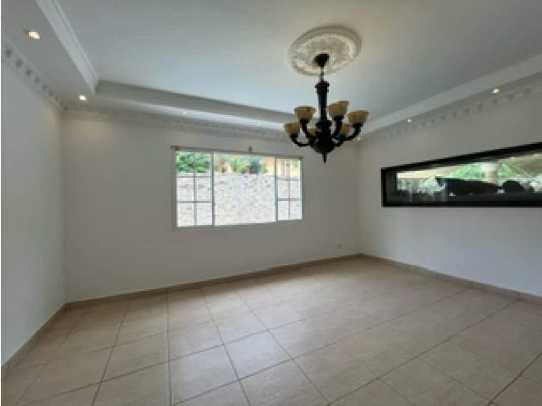 Guest half bath with elegant fixtures and decorative border tiles PH Costa Dorada Panama