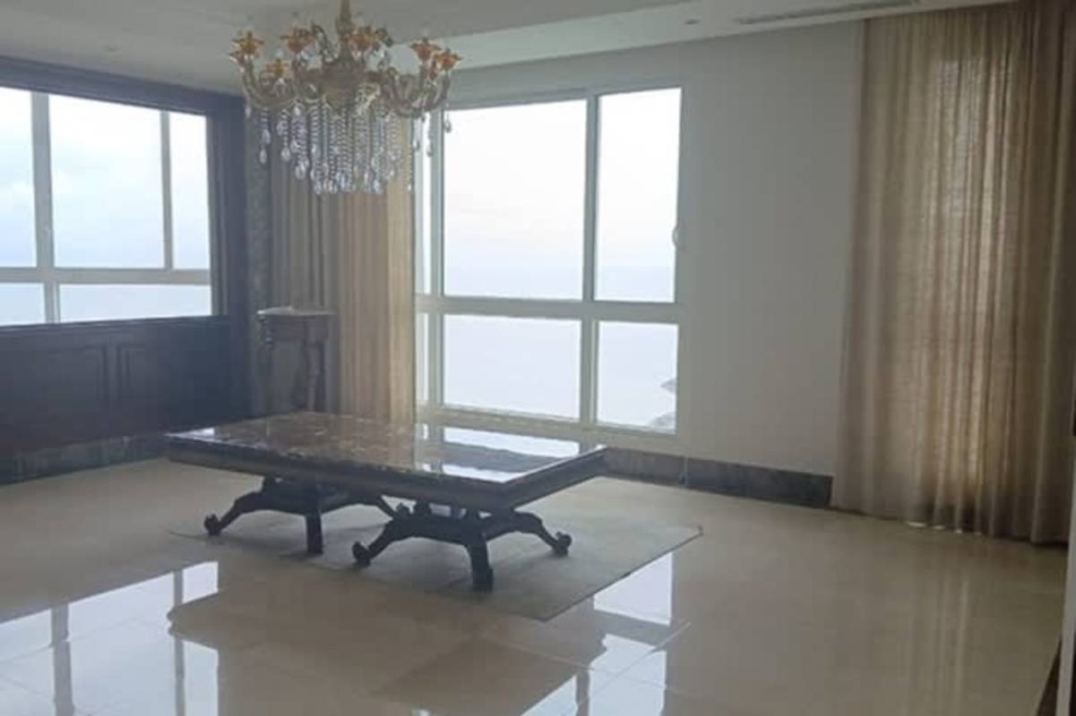 Living space with panoramic water view, marble flooring, and luxury finish at PH Oceanfront Punta Pacífica Panama