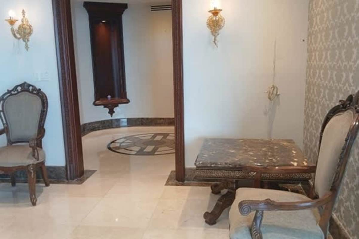 Spacious luxury kitchen with granite countertops island built-in appliances oceanfront condo Punta Pacífica