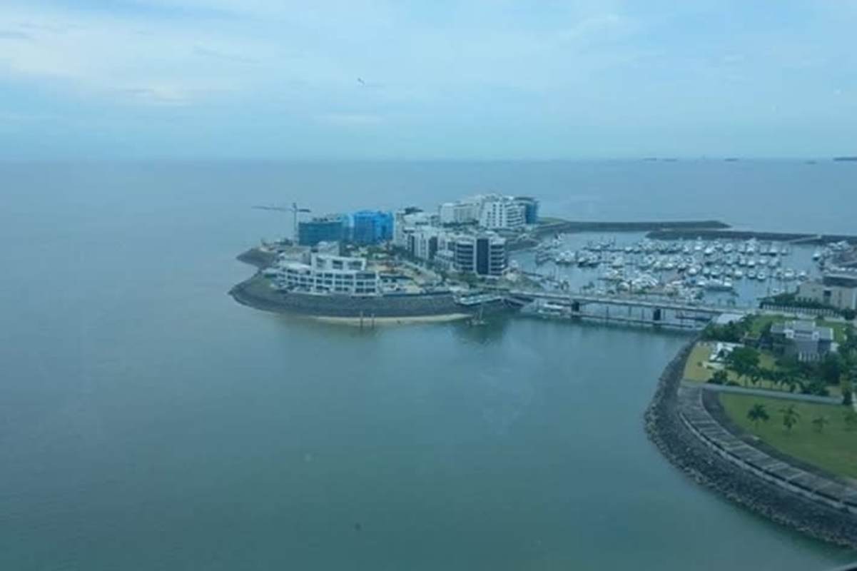 Luxury living room with floor-to-ceiling windows and stunning Pacific Ocean view Punta Pacífica Panama