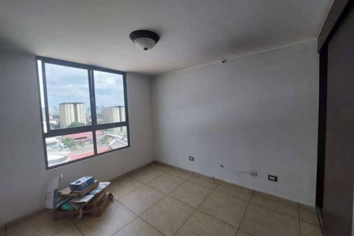 Apartment bedroom large window city skyline view PH Condado Country Club Panama