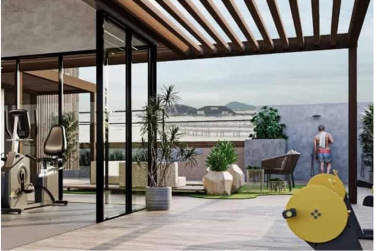 Rooftop BBQ and lounge space with seating and skyline view at PH Bella Vista Panama