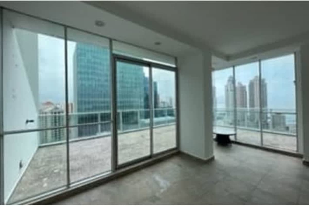 Open kitchen with granite countertops and wood cabinets PH Ocean Pacific Punta Paitilla Panama