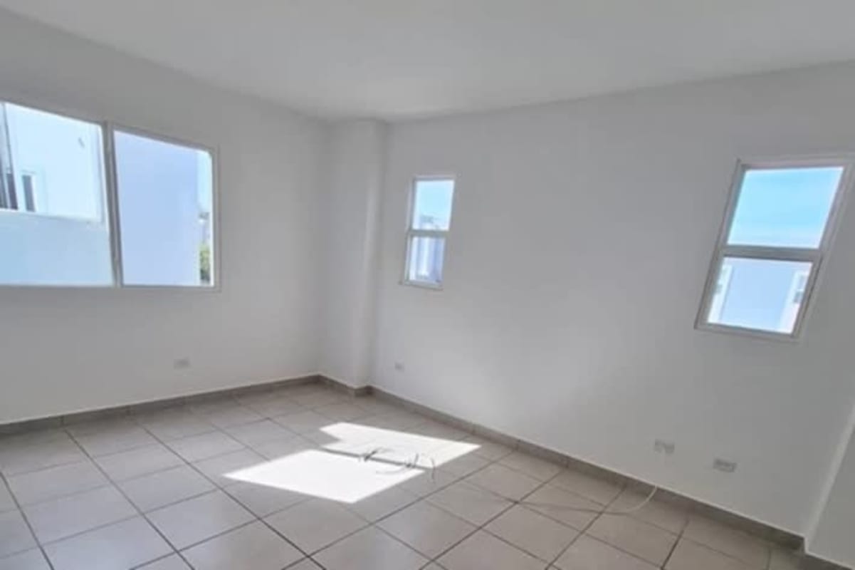 Spacious bedroom with closet and large window in family home Paseo del Norte Panama