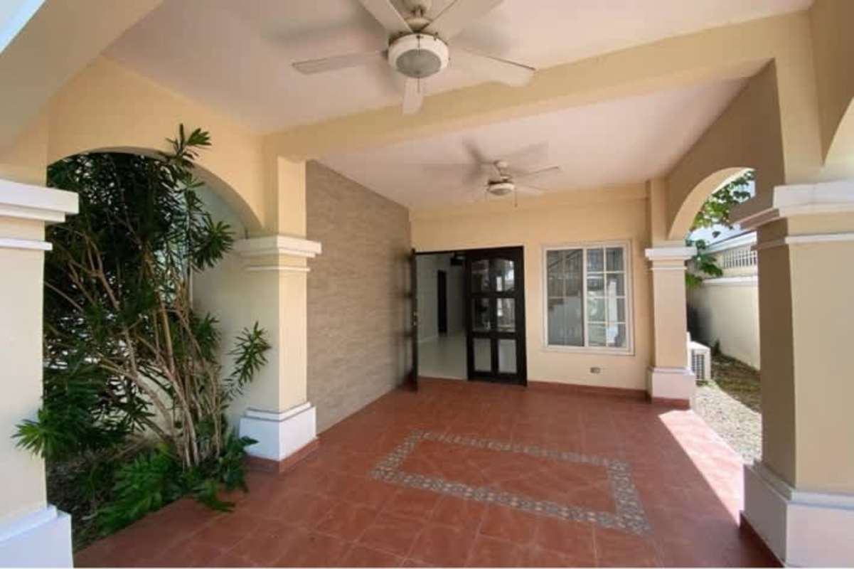 Spacious kitchen granite counters and tile backsplash Costa Sur house Panama