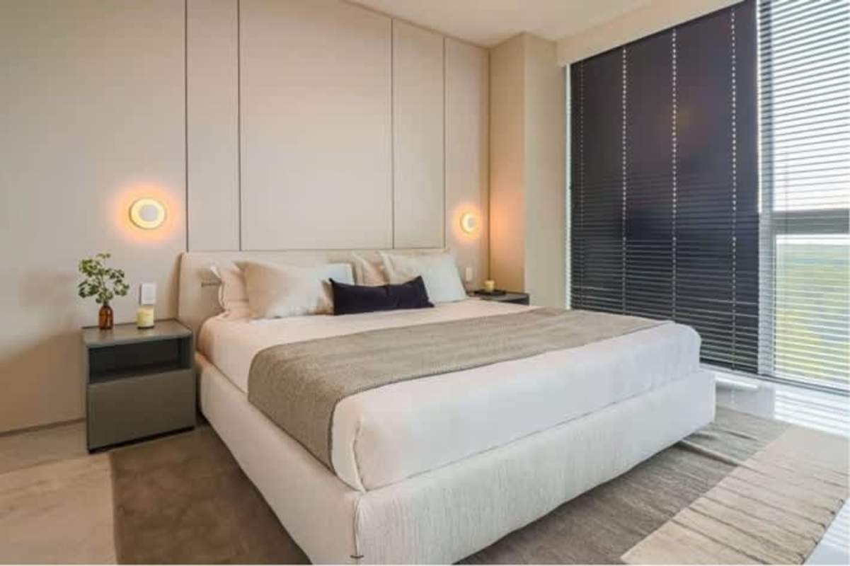 Spacious master bedroom with private balcony overlooking Santa Maria golf course