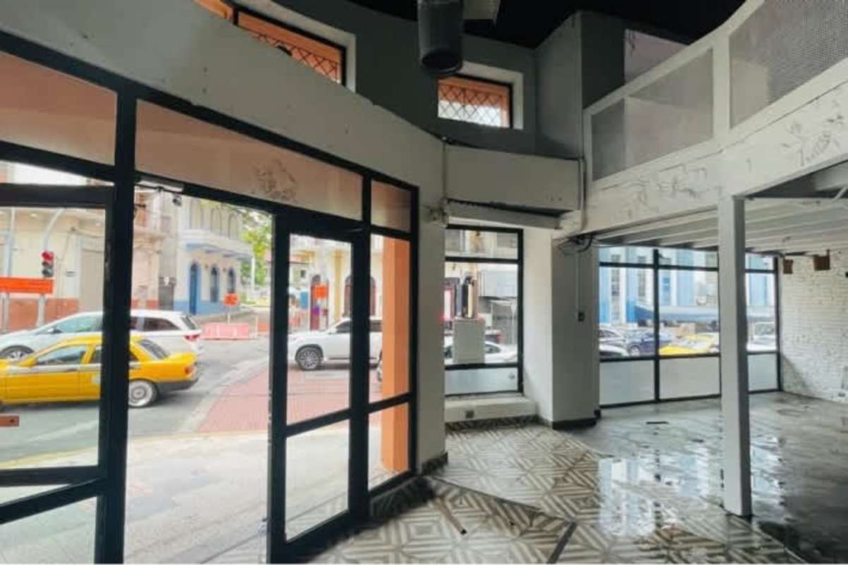 Spacious commercial interior with glass windows, loft area and high ceilings Casco Viejo Panama