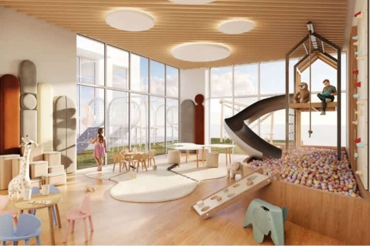 Children's playroom with slide, natural light and climbing inside PH Costanera Torre Aqua Panama City